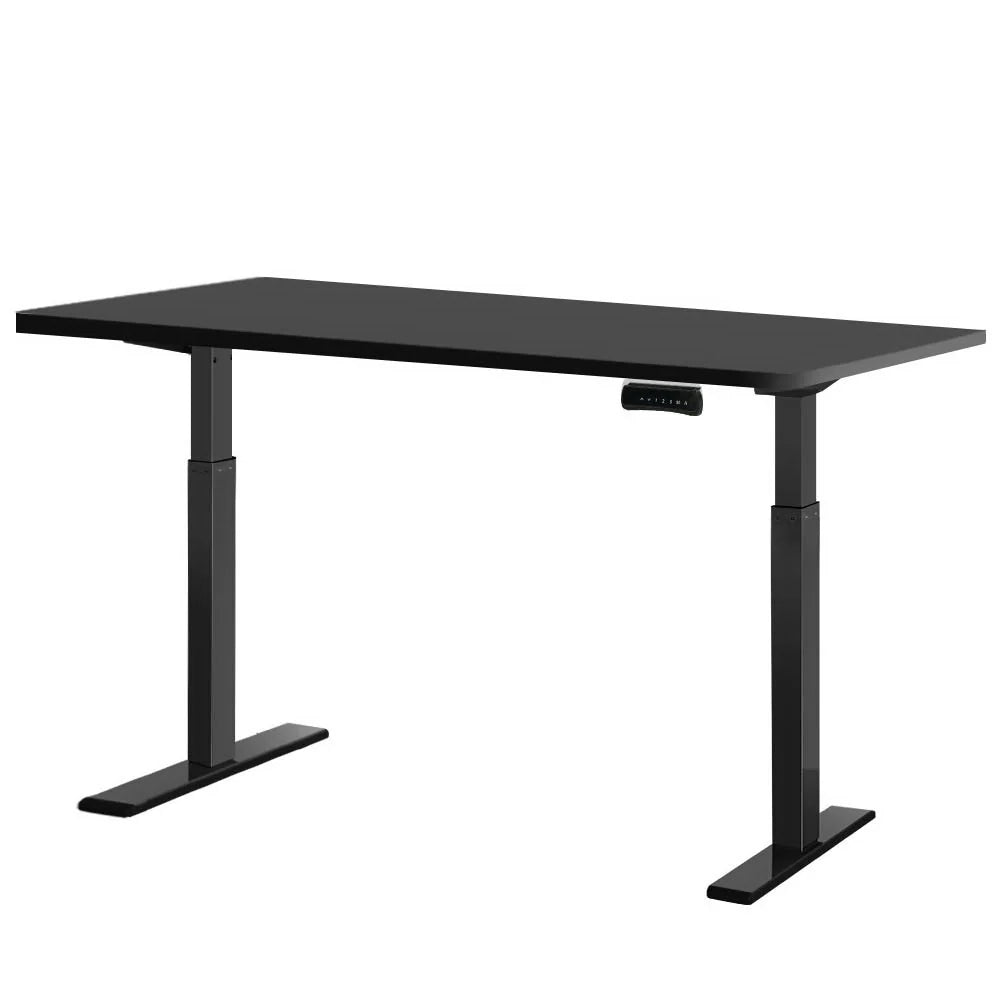Angled front view of the Studio Pro Series black motorised standing desk workstation.