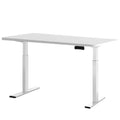 Angled front view of the Studio Pro Series white motorised standing desk workstation.