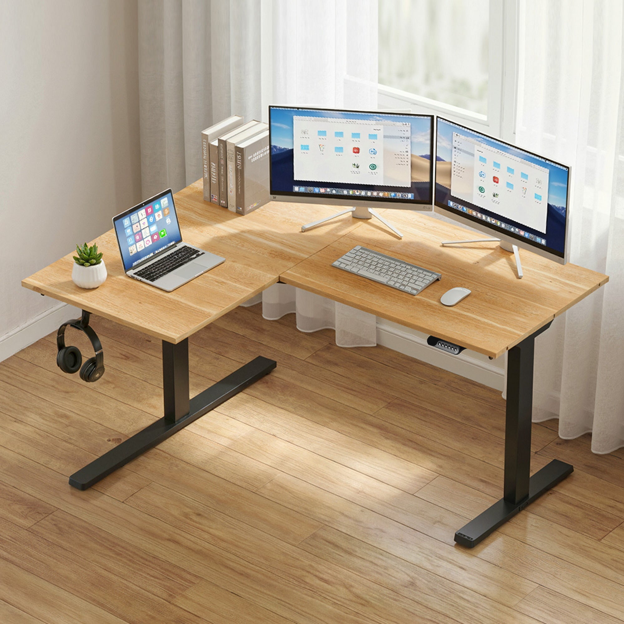 Ergonomic L-shaped corner desk set up in a modern home office workspace with a dual monitor display.