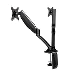 Angled front view of the Studio dual gas-spring monitor arm desk mount in black.