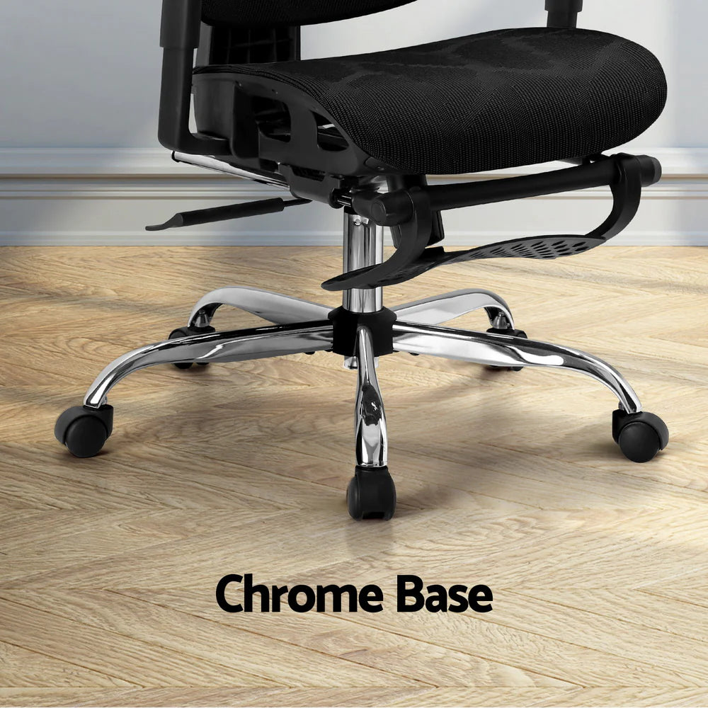 Close-up detail showing the heavy-duty chrome base and smooth-rolling caster wheels of the reclining desk chair.