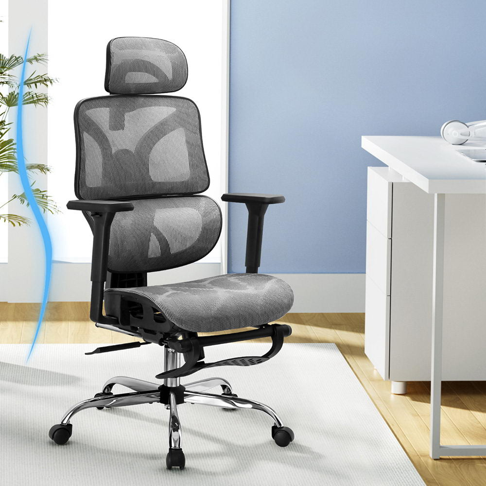 Grey Studio ergonomic desk chair positioned in a modern, bright home office workspace.