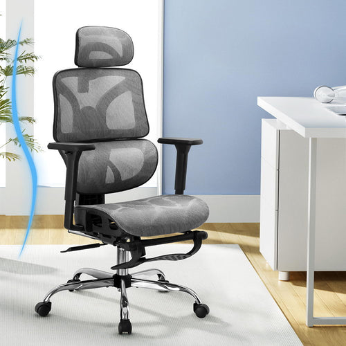 Grey Studio ergonomic desk chair positioned in a modern, bright home office workspace.