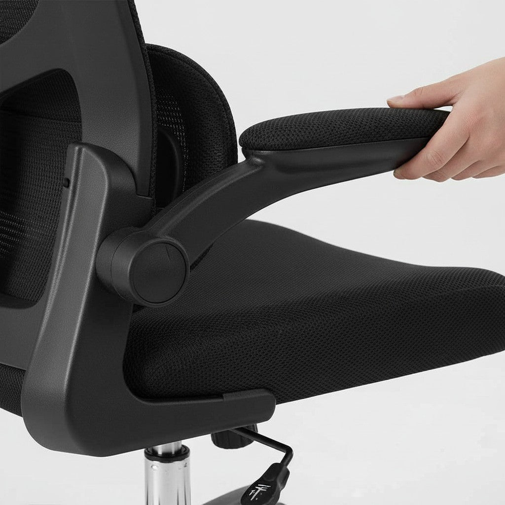 Cloud Office Studio ergonomic black mesh office chair with 3D adjustable armrest being positioned by a hand