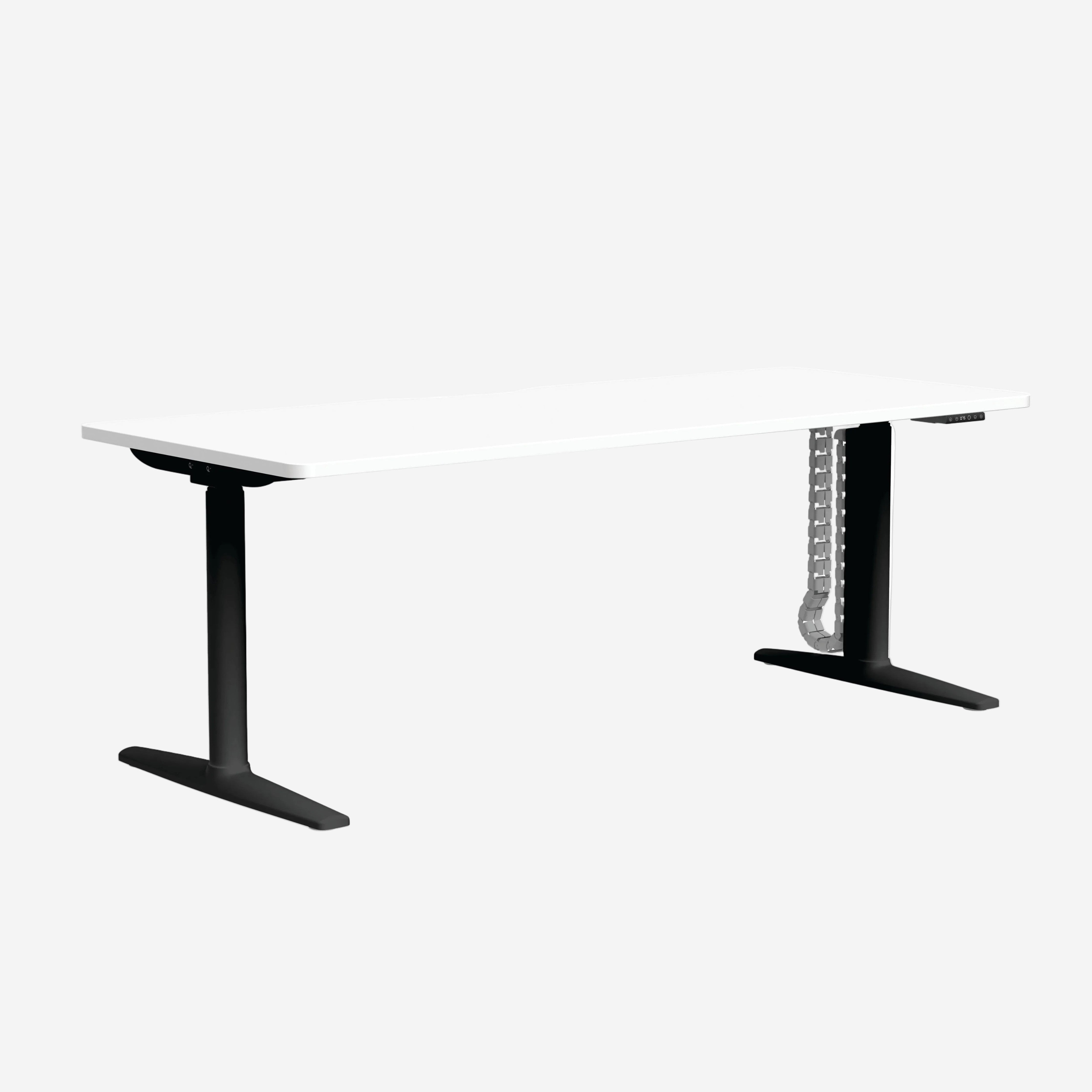 Cloud Office Studio Buro Syntra white standing desk with black dual-motor legs and integrated cable management spine