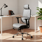 Cloud Office Studio slate grey mesh executive chair with retractable footrest and adjustable headrest in a modern home office.