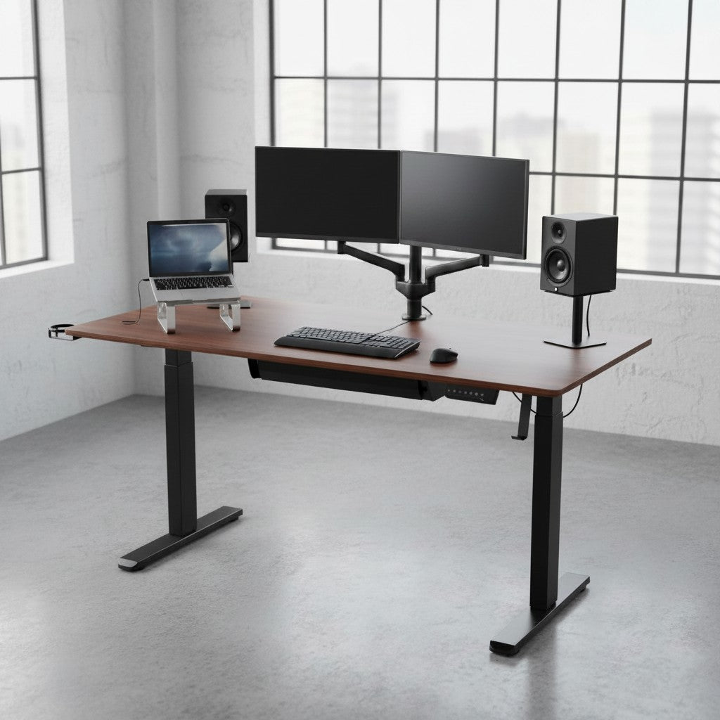 Cloud Office Studio walnut standing desk with black industrial frame, dual monitors, and laptop in a modern office.