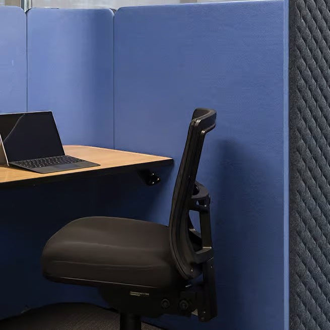 Side profile of the Buro Metro II ergonomic chair tucked into a blue acoustic office privacy pod.